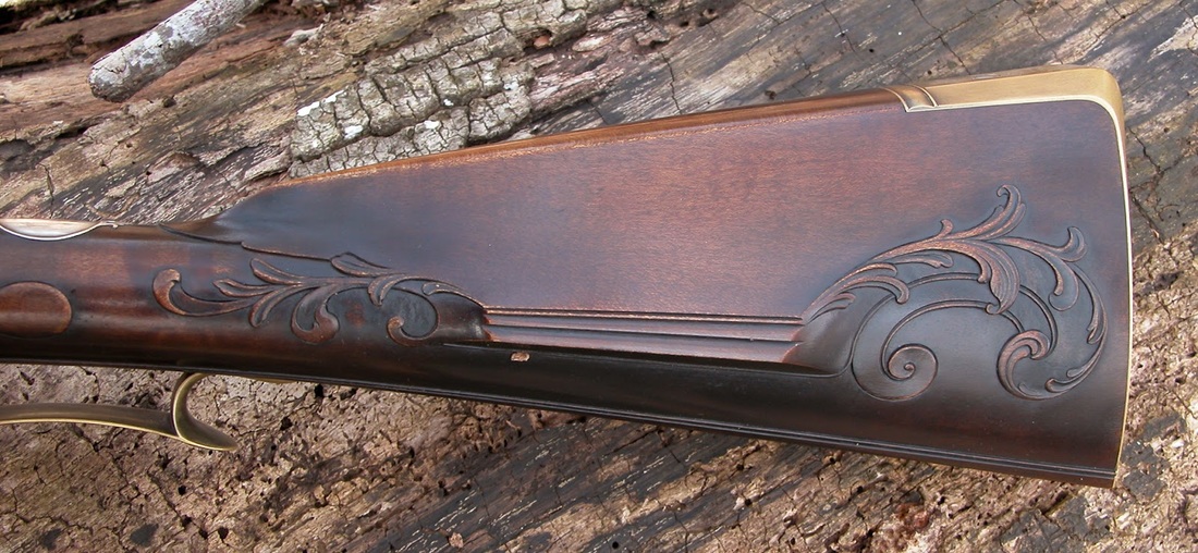 Jim Kibler Rifle in new school developed by John Bivens carved maple